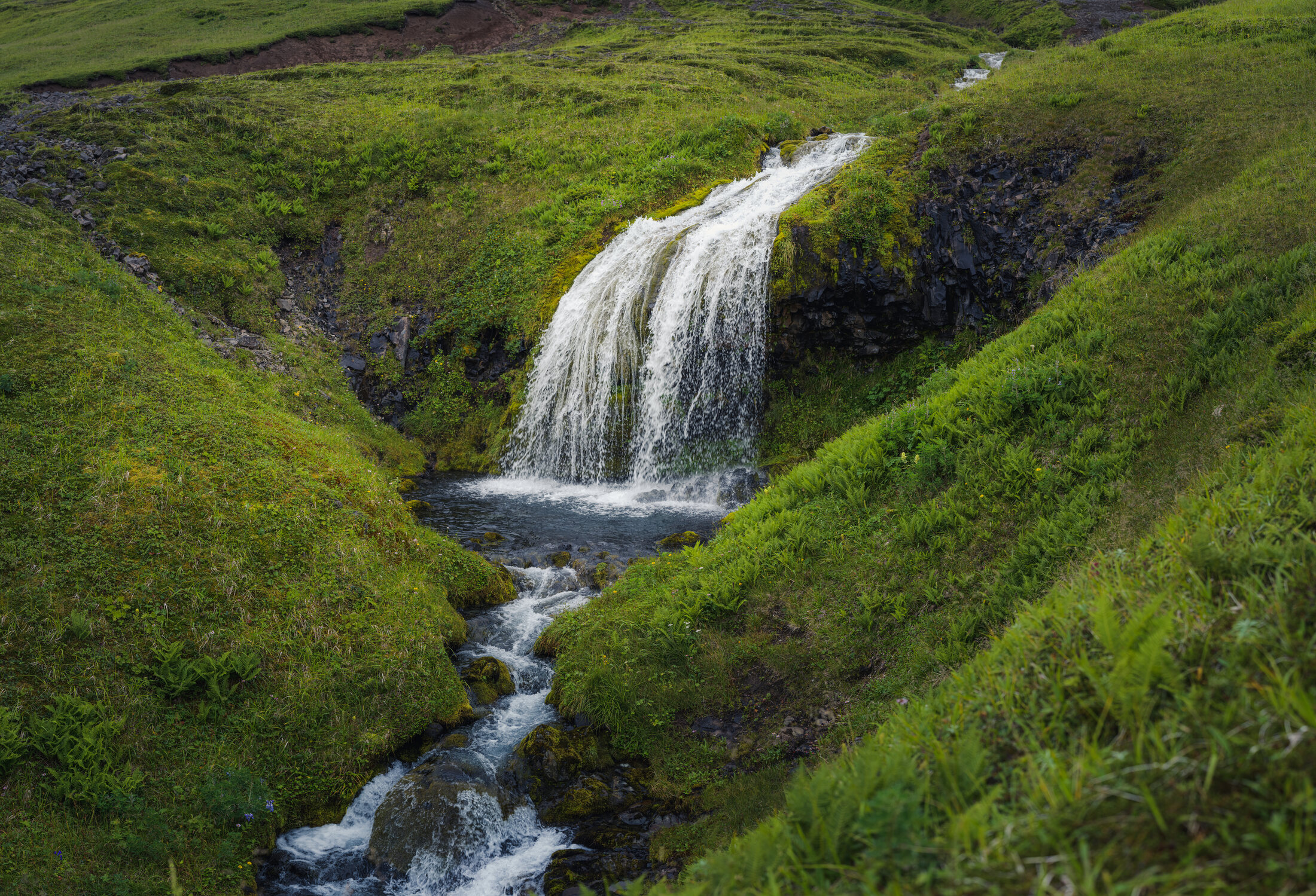 Stream running through Umnak grassland